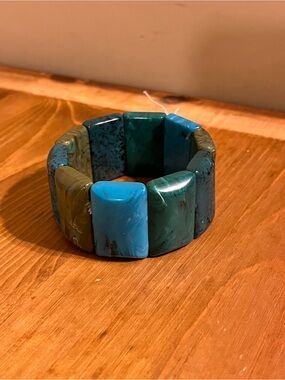 New with tag from Macy’s panel stretch bracelet in turquoise green color 6 1/4”